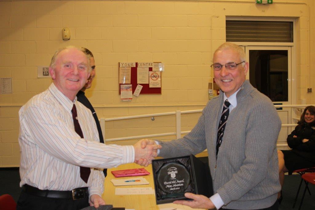 Alan Newnham receiving his award