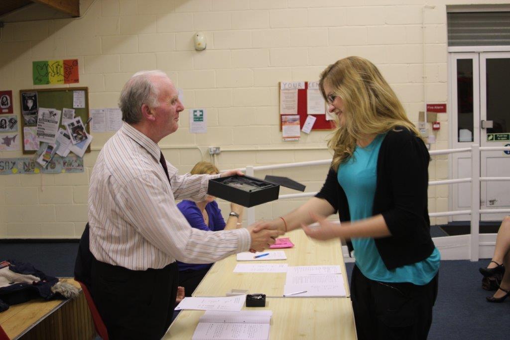 Claire Powell receiving her award